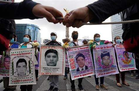 Mexico arrests former official in disappearance of 43 students in 2014, charges 8 soldiers